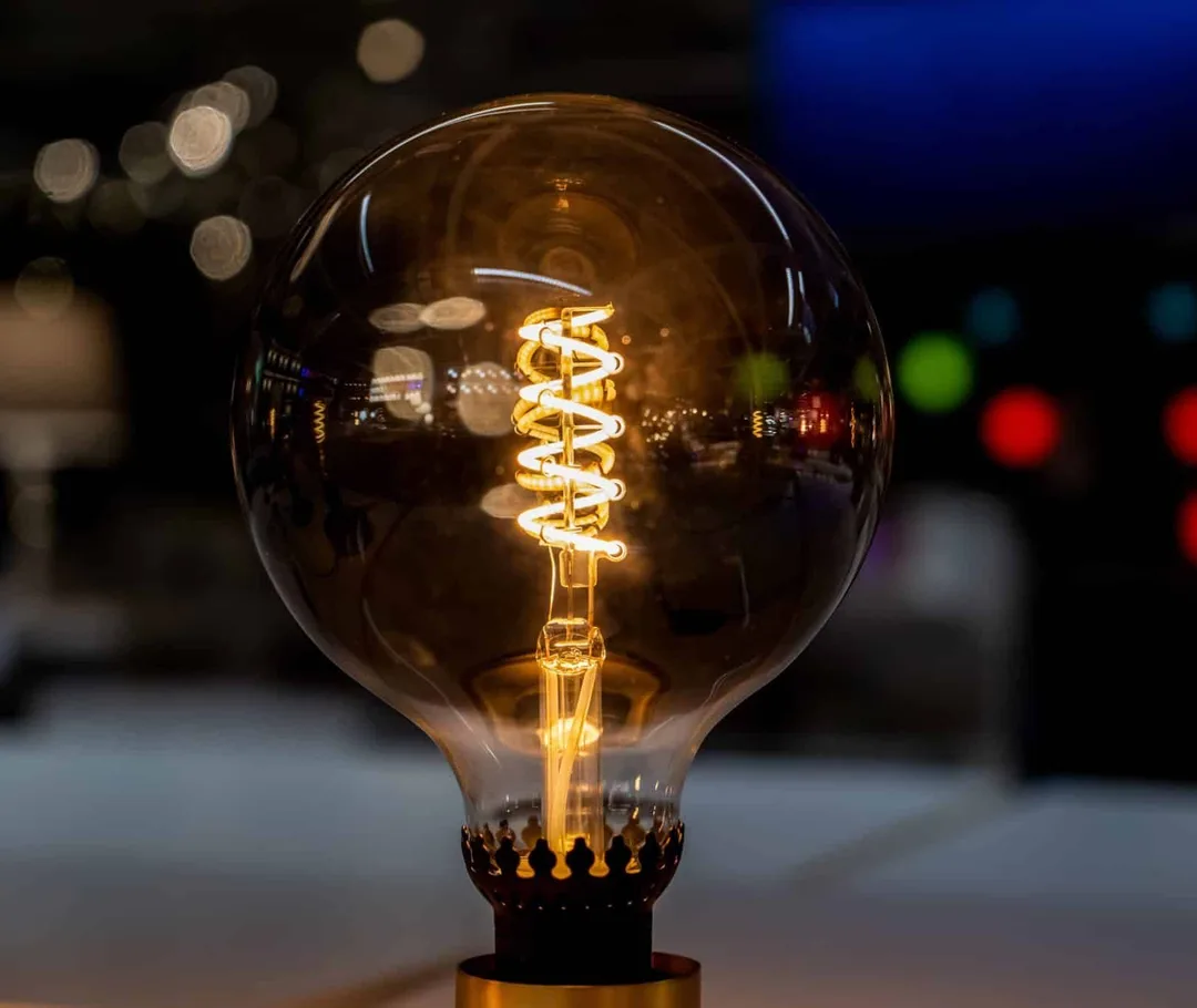 Large globe edison light bulb in the dark 2022 11 15 14 05 22 utc